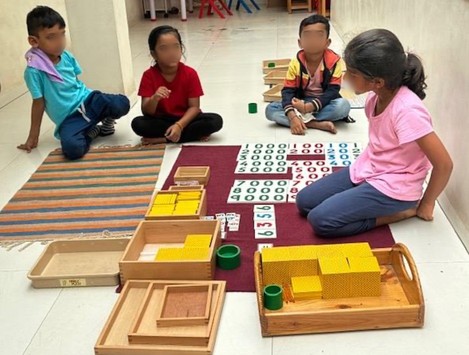 Building large numbers with beads and cards
