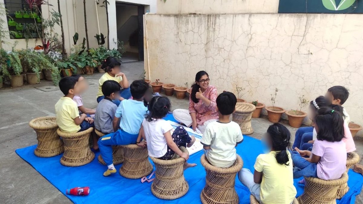 Monali Lodha with children, outdoors