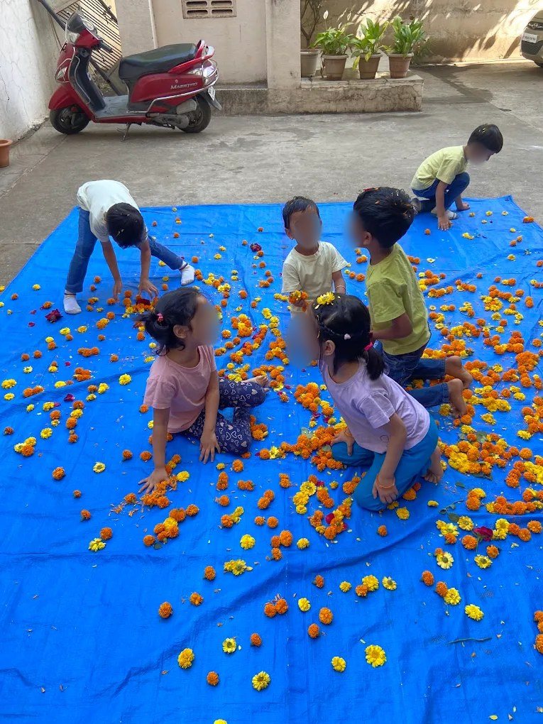 Playing with marigold flowers